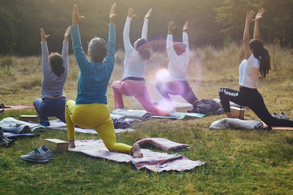 Office employees in a corporate yoga session led by Ritika Khandelwal in Jaipur